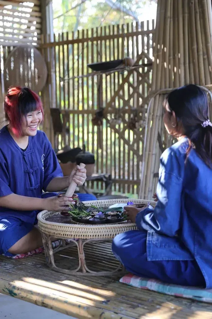 People making a Thai herbal product